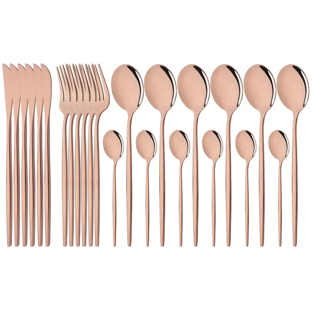 Elegant modern pink stainless steel flatware set consisting of 48 pieces laid out in an aesthetically pleasing arrangement.