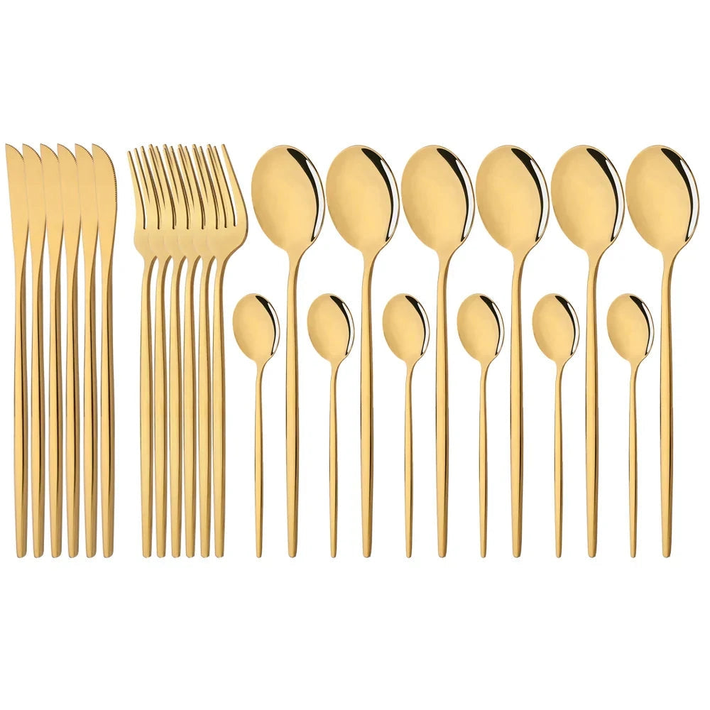 Elegant modern pink cutlery set featuring 48 pieces of gold-accented stainless steel flatware, including forks, knives, and spoons, displayed in an artistic arrangement against a plain background.