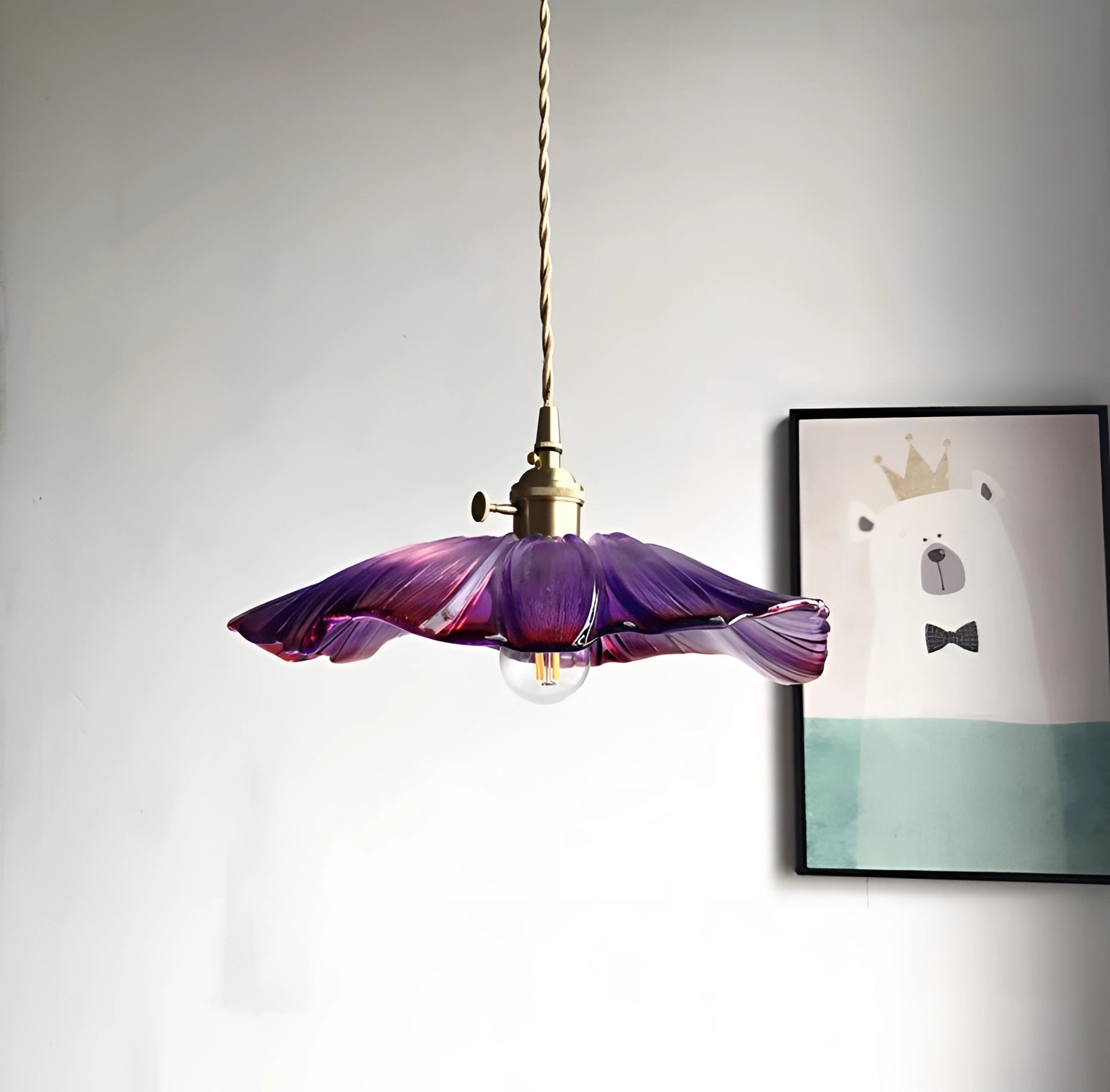 Purple handblown glass pendant light with an artistic design, featuring a rectangular shape and twig accents, creating a unique and elegant ceiling fixture.