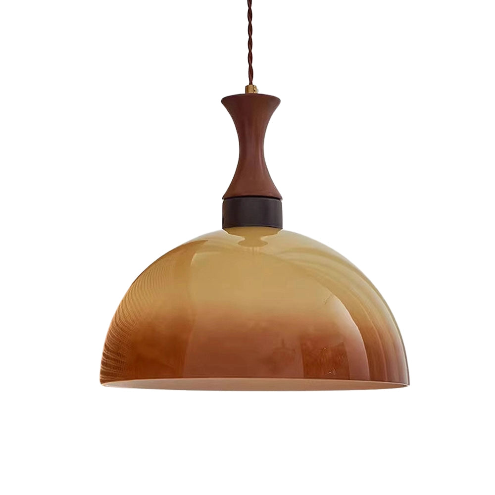 Retro yellow mid-century pendant light with amber tint, featuring wood and metal elements, styled as modern home and plant decor.