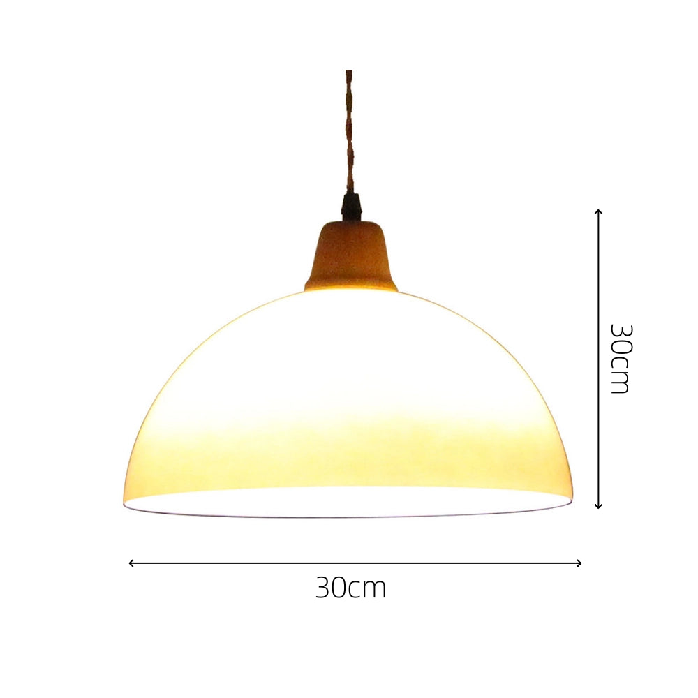 Retro yellow mid-century pendant light with a dome-shaped design, perfect for modern home and plant decor.