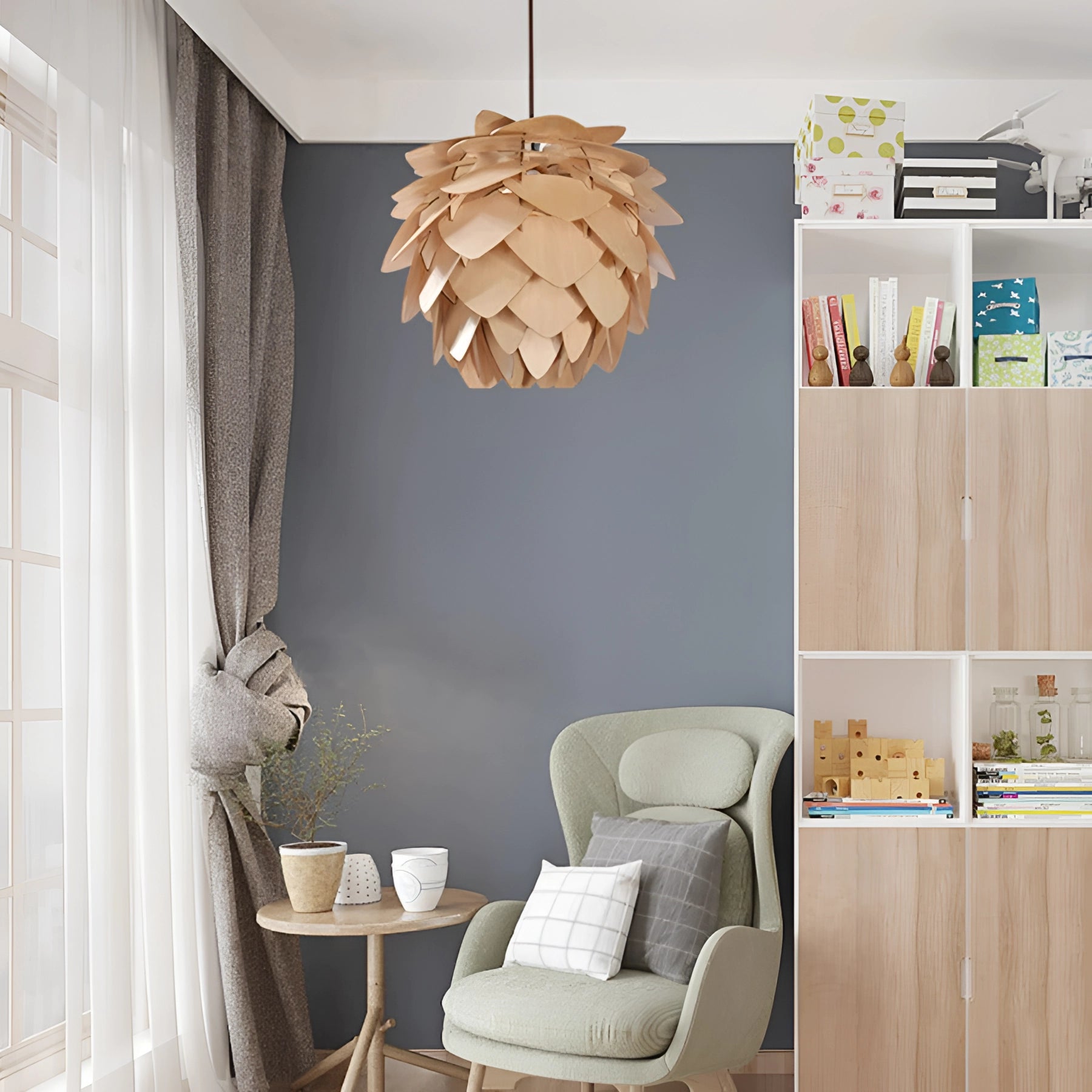 Scandinavian Pinecone Pendant Light hanging from the ceiling in a modern living room setting, featuring a white and natural wood design, illuminating the space with a cozy, organic ambiance.