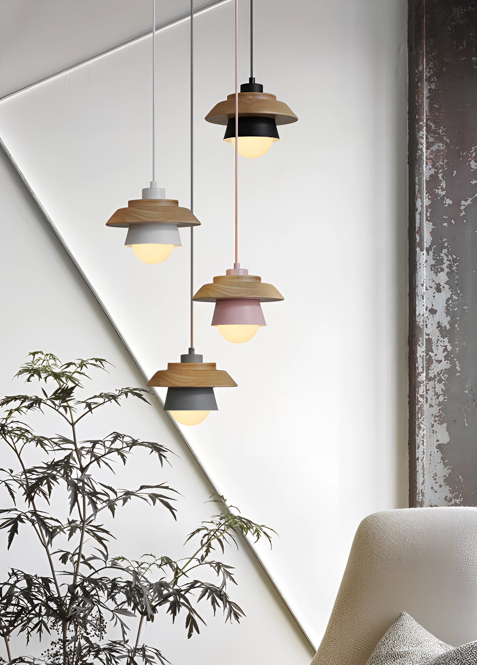 Scandinavian wooden pendant light with a modern design, featuring eco-friendly materials and a sleek white shade, hanging from a ceiling. The lamp is surrounded by minimalist decor, including shelving and a plant, creating a clean and stylish ambiance.