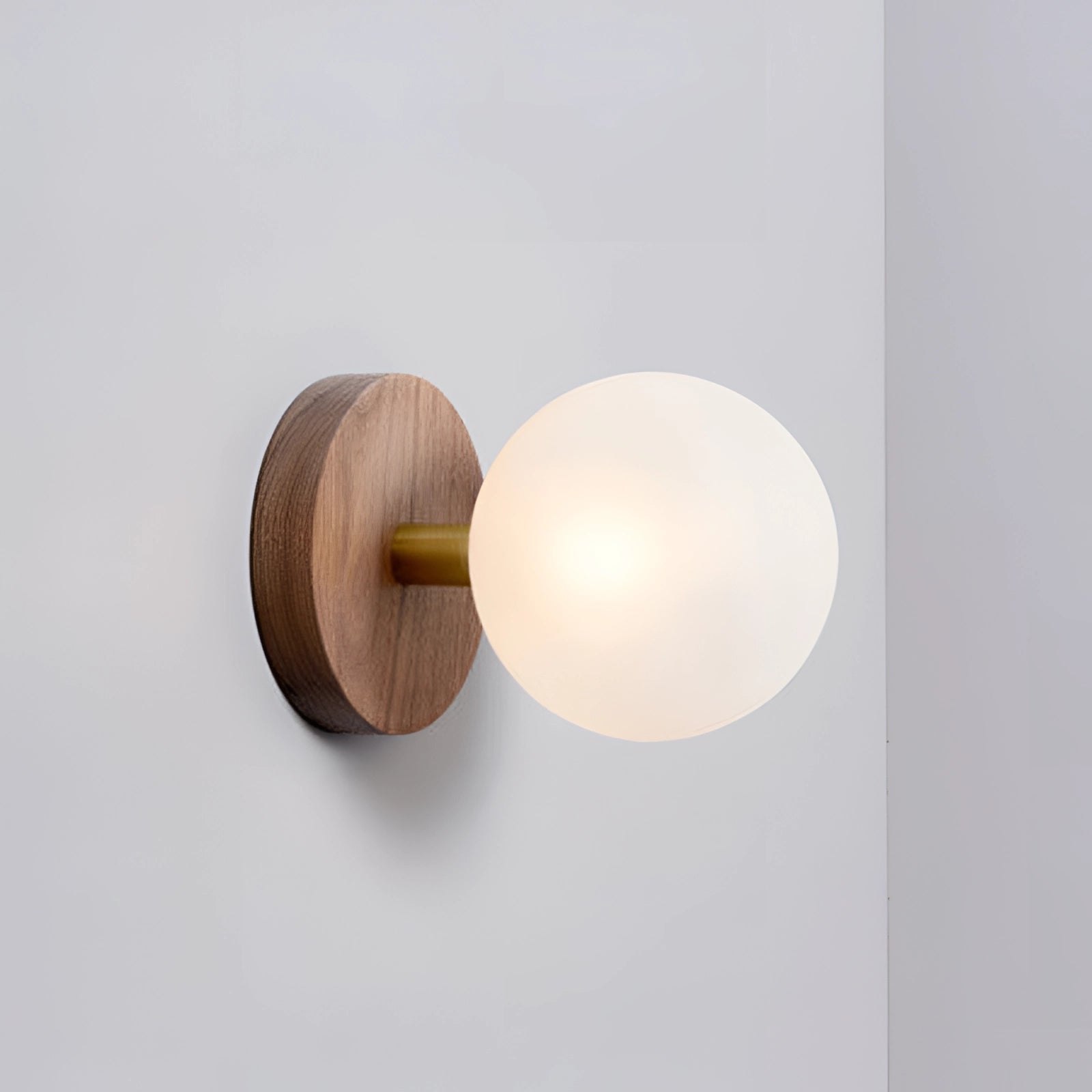 Minimalist Scandinavian wooden wall sconce with milk white glass shade, featuring modern eco-friendly design.