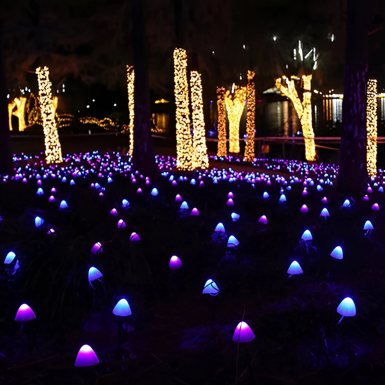 Solar LED mushroom garden lights in a whimsical, decorative arrangement, featuring a waterproof design with vibrant purple hues, creating an enchanting visual effect against a dark outdoor setting.