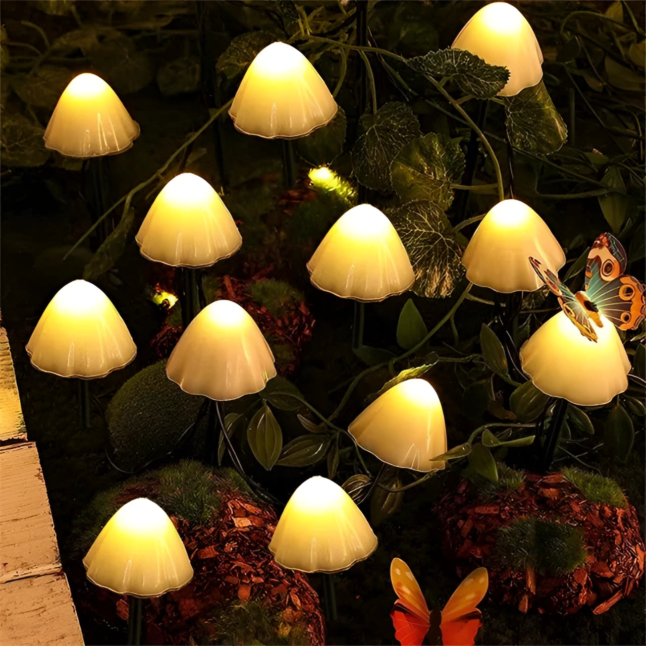 Solar LED mushroom garden lights with warm orange glow, featuring 30 LEDs along a 6.5-meter string, set in a natural outdoor setting with greenery and twigs, providing waterproof yard decor lighting.