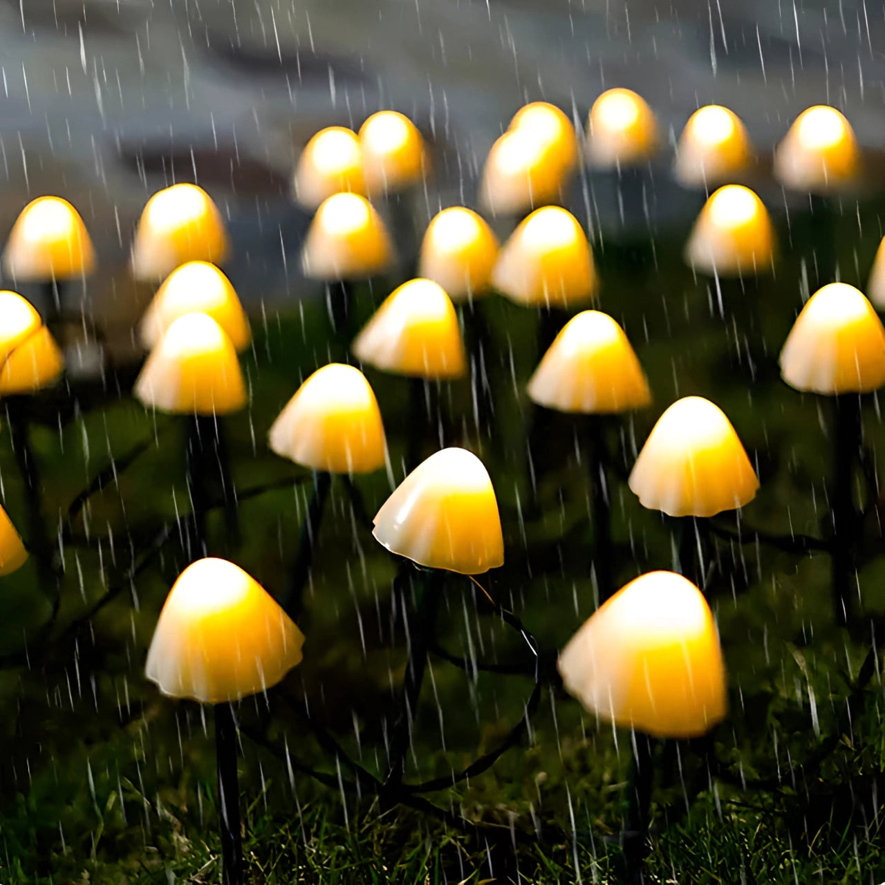 Solar LED mushroom garden lights nestled among green grass, resembling natural mushrooms.