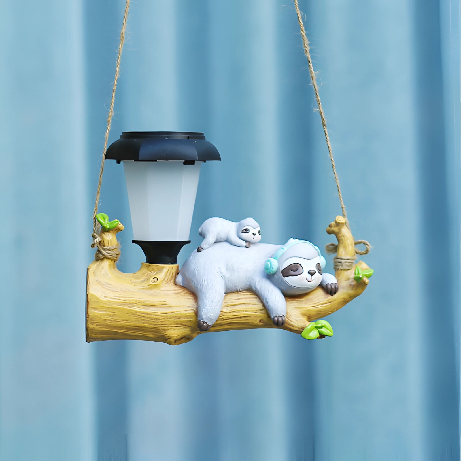 Squirrel-shaped solar garden lamp featuring an LED light, designed for outdoor use. The lamp is shaped like a playful squirrel with realistic details, blending charmingly into garden settings.