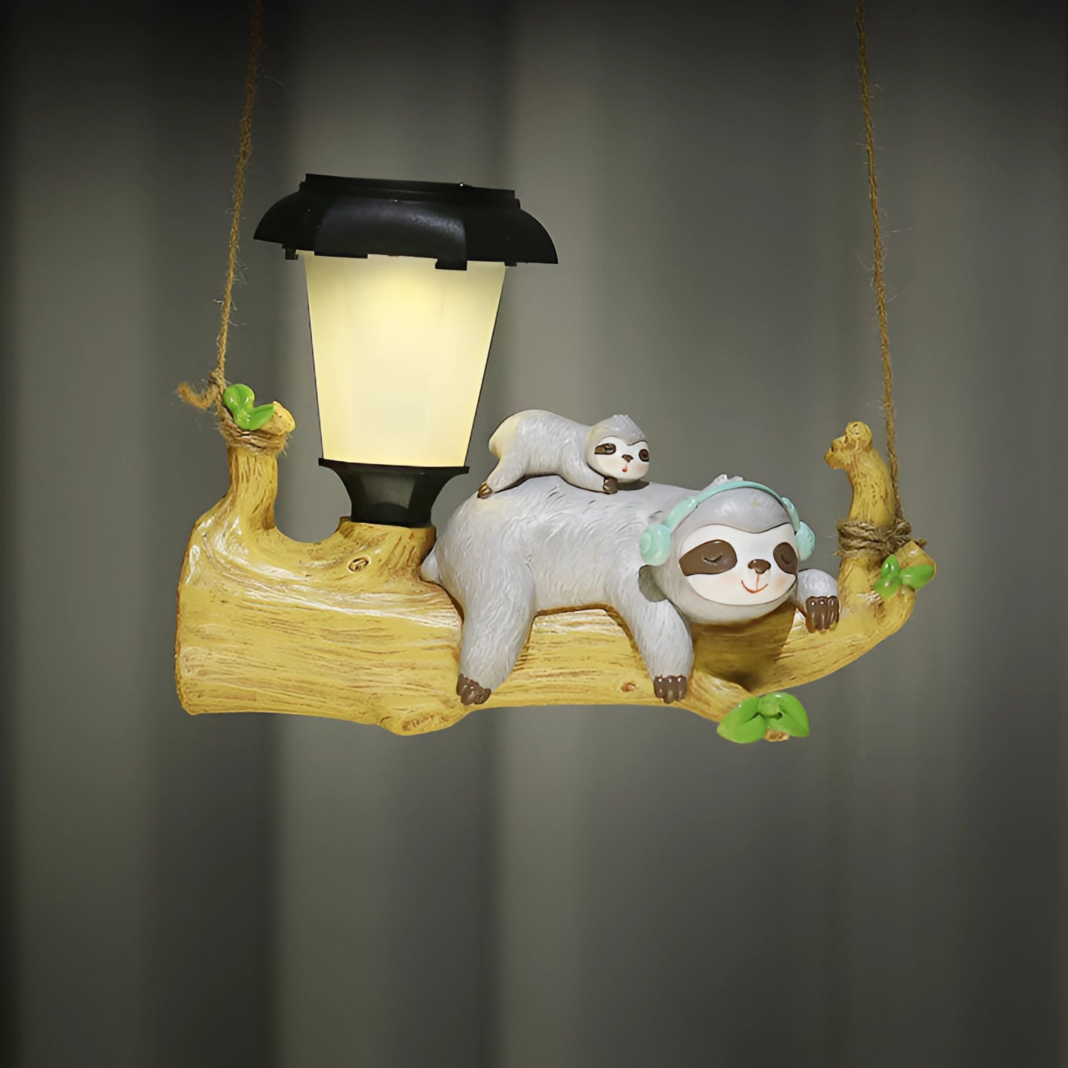 Squirrel-shaped solar garden lamp featuring an LED light, designed to resemble a playful squirrel with detailed wood-like texture and a bushy tail, ideal for outdoor decoration.