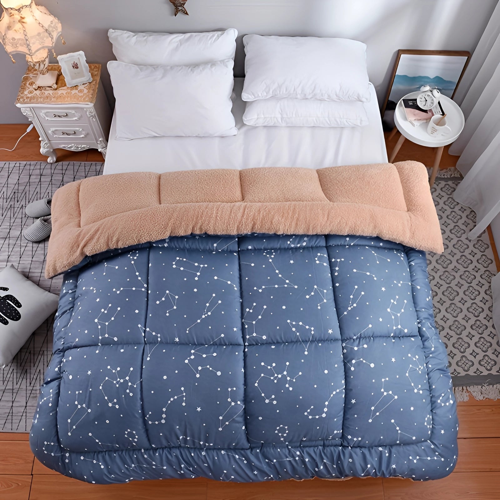 Blue Star Weighted Blanket on a Bed in a Room with Wooden Flooring and Bed Frame