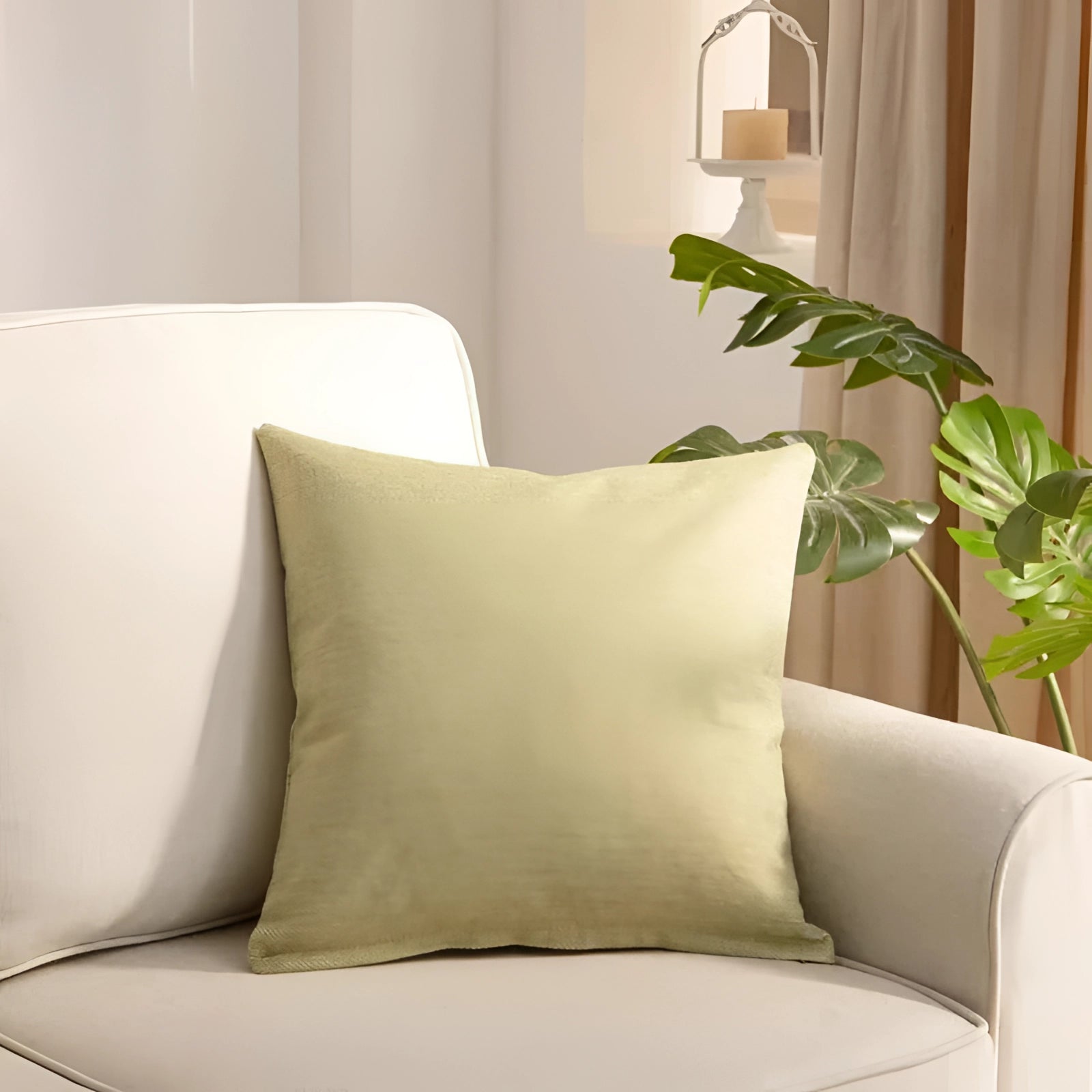 Green striped accent pillow measuring 45 x 45 cm on a modern living room sofa, surrounded by neutral decor elements including a white lamp, wooden flooring, and a green plant, enhancing comfort and interior design ambiance.