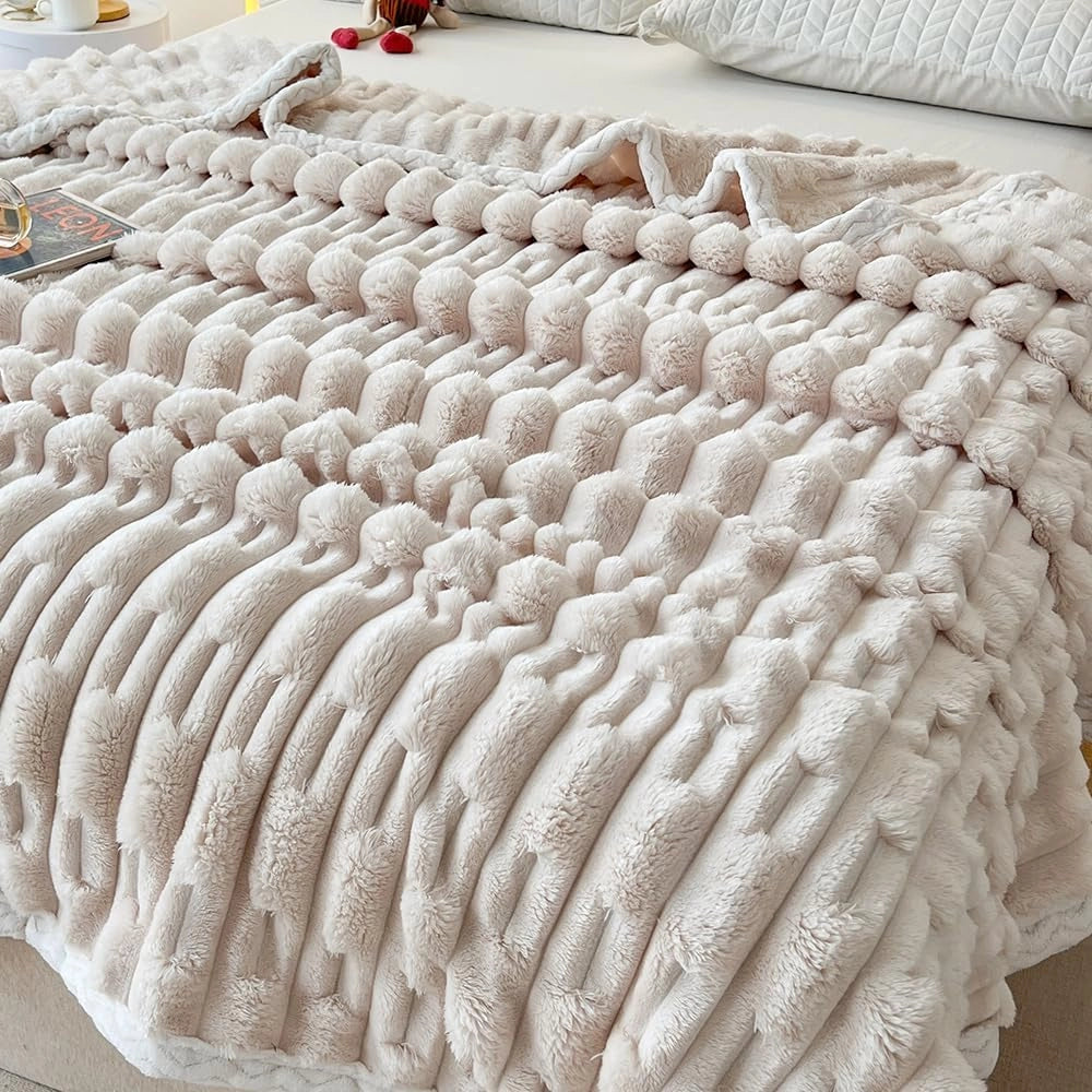 Soft and luxurious turquoise chunky knit blanket in an apricot hue, displayed in a braided pattern, measuring 200cm x 230cm.