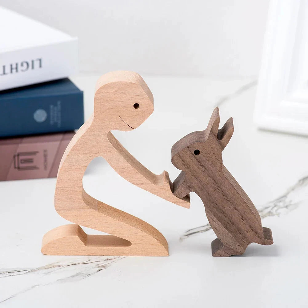 A festive holiday figurine of a wooden dog sculpture adorned with a striped scarf, showcasing intricate craftsmanship and a warm, rustic charm.