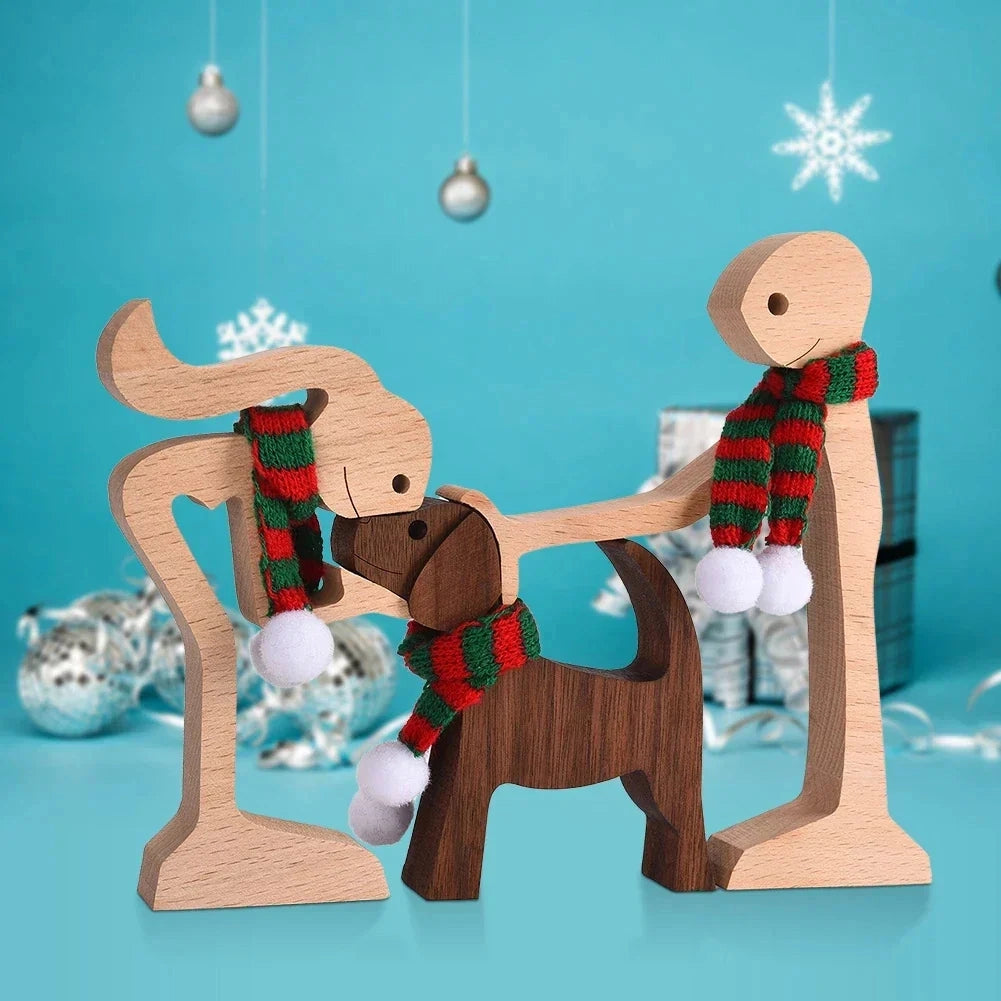 A wooden dog sculpture wearing a striped scarf, designed as a festive holiday figurine, set against a plain background.