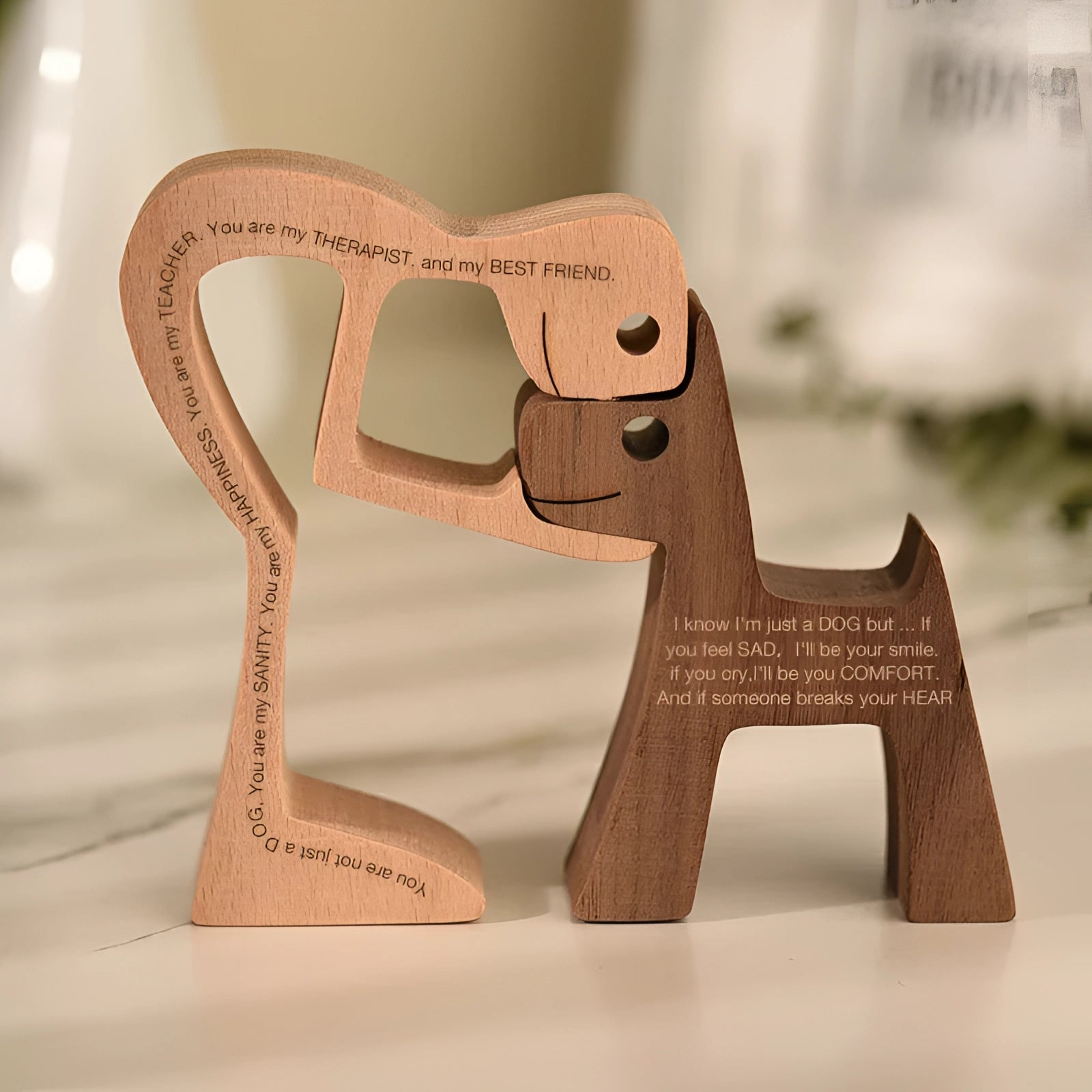 Wooden dog sculpture featuring a striped scarf, crafted to resemble a fawn, festive holiday figurine.