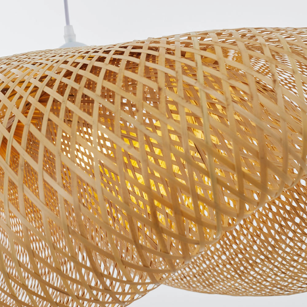 Handmade woven LED pendant light made from natural fibers in amber and gold tones, featuring a mesh pattern with a wooden and metal ceiling fixture.