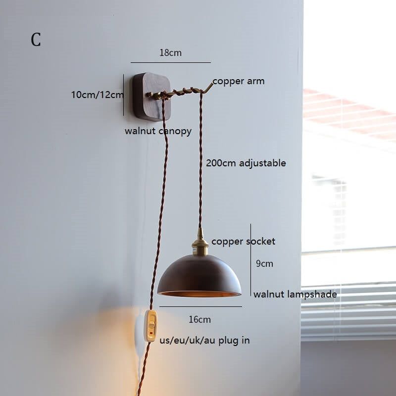 Walnut wooden wall lamp with copper arm and adjustable height.