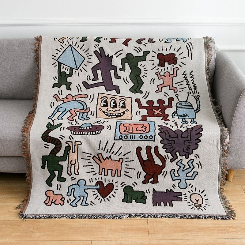 Taavita Puzzle Knitted Blanket – Modern Artistic Elegance for Culturally Conscious Interiors